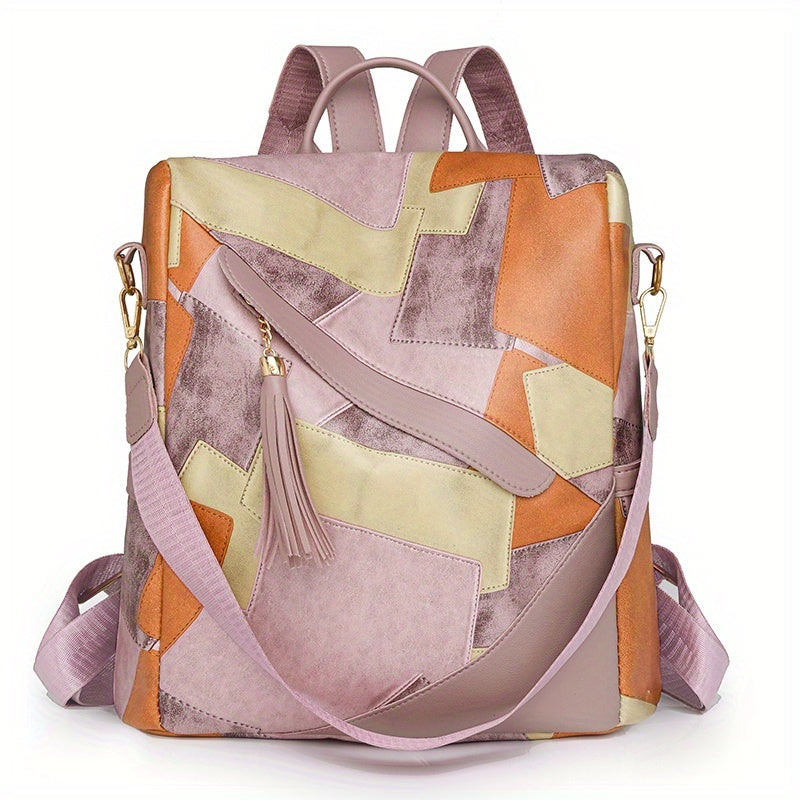 Sac à dos patchwork rose, orange et jaune pâle vu de face, avec pampille, bandoulière et bretelles roses. 11