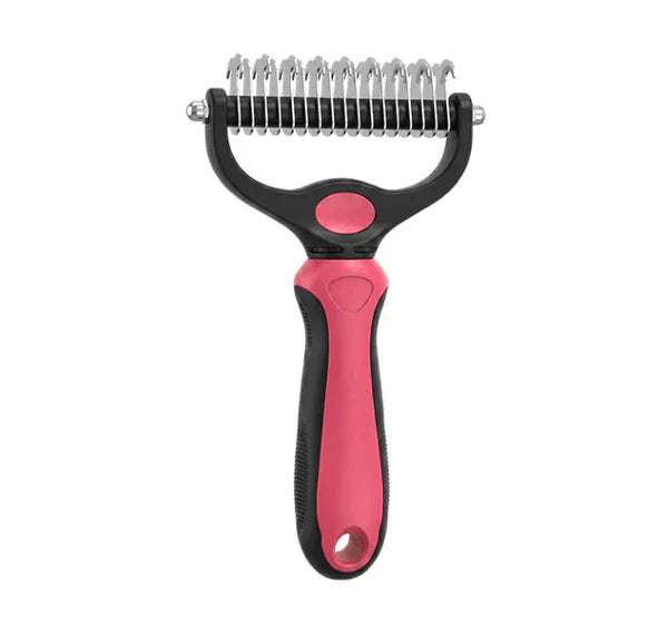 Peigne à poignée rose et noire vu de face, côté lame aux dents crochues en acier. 13
