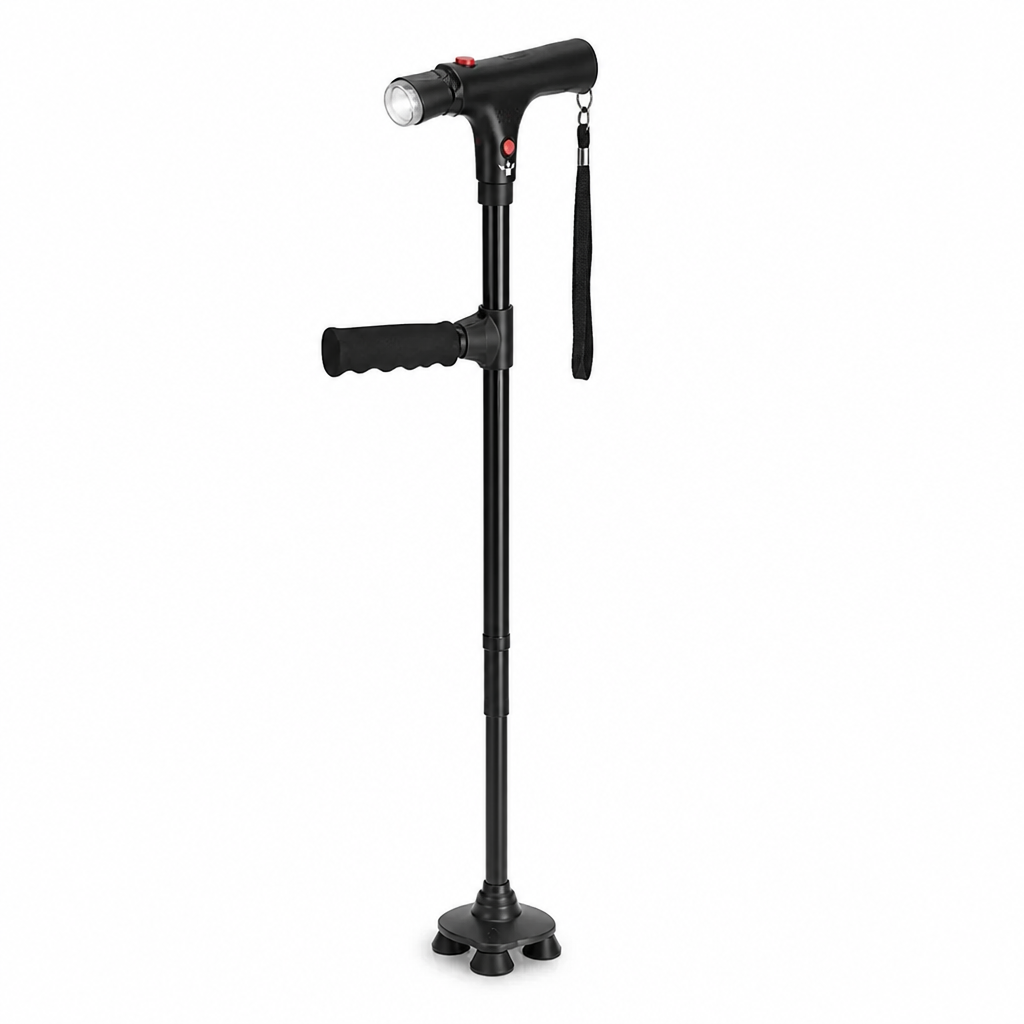 Canne noire vue de face sur fond blanc, avec poignée en T, lampe, dragonne et base à quatre pieds 1