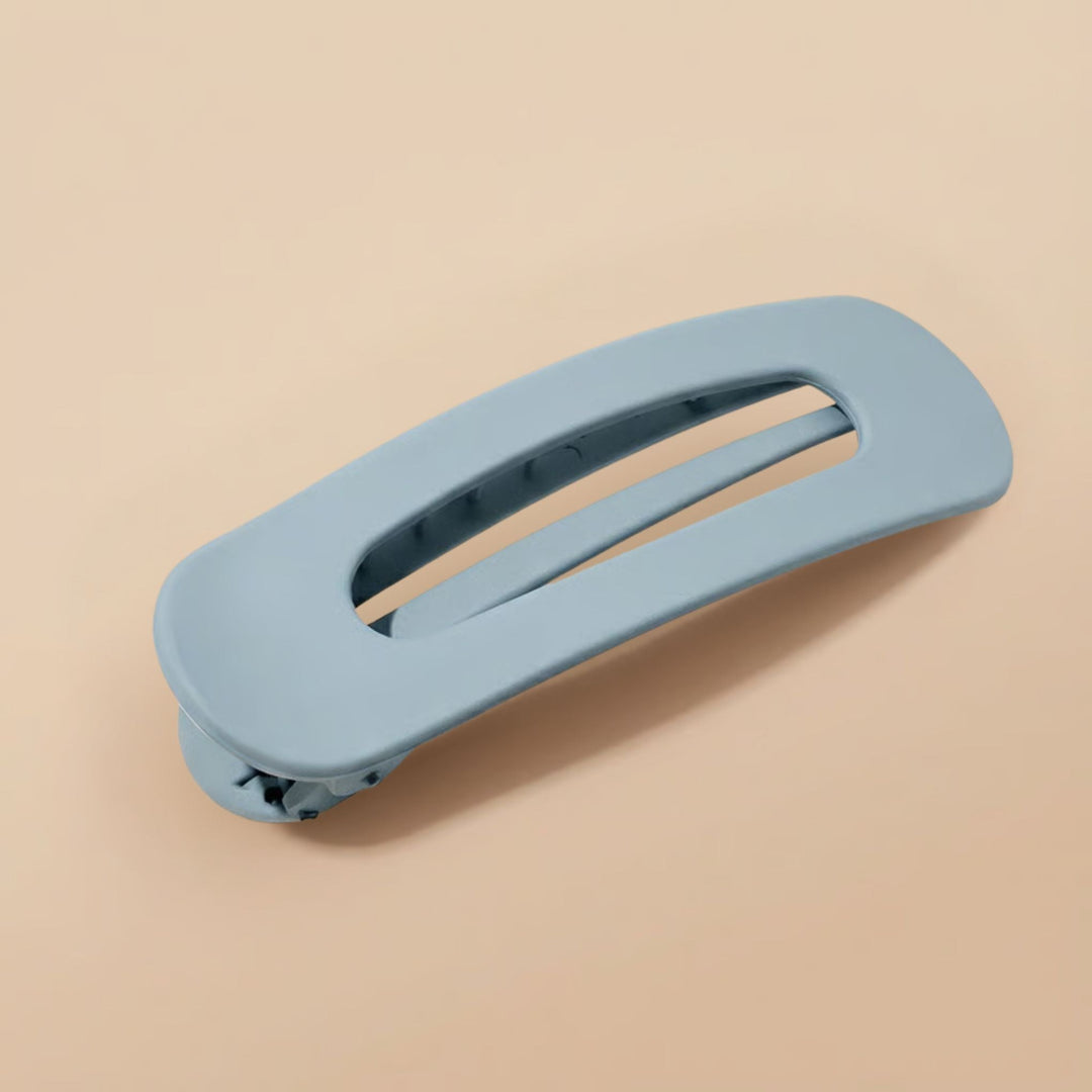 Barrette plate bleu gris mate vue en perspective, avec le mécanisme de pince visible 10