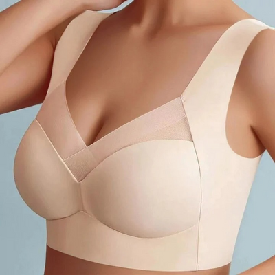 Modèle portant le soutien-gorge beige, larges bretelles et bande ajourée croisée sur le décolleté, vue de face. 17