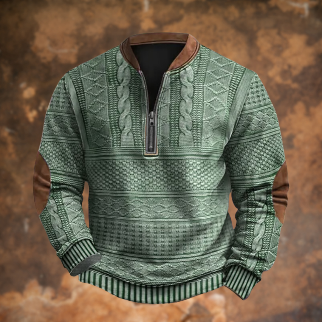 Version vert sauge du pull demi-zip aux torsades, col et coudières marron, zip sombre, vue de face. 6