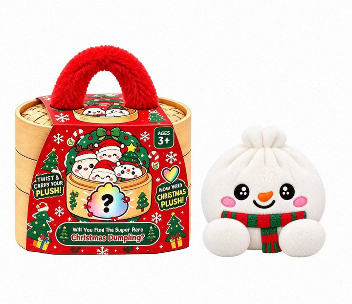 Peluche ravioli bonhomme de neige blanc, nez orange, écharpe rouge et verte, devant la boîte de Noël 18