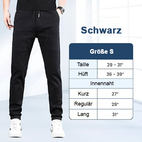 Pantalon noir porté par un homme, accompagné d'un tableau de tailles en pouces pour la taille S 4