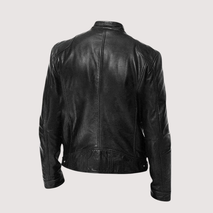 Veste noire vue de dos, avec coutures verticales et ceinture réglable à boutons-pression 3