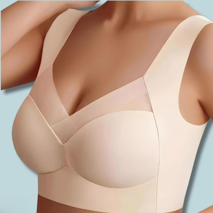 Soutien-gorge beige porté de trois quarts, avec empiècement en voile croisé sur le décolleté et bretelles larges. 4