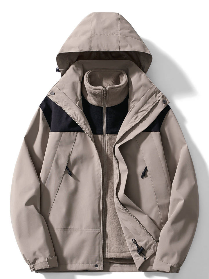 Version beige taupe de la veste à capuche avec empiècements noirs, doublure polaire assortie visible sous la veste ouverte. 4