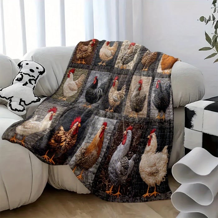 Couverture à poules aux tons gris et bruns posée sur le bras d'un canapé blanc 13