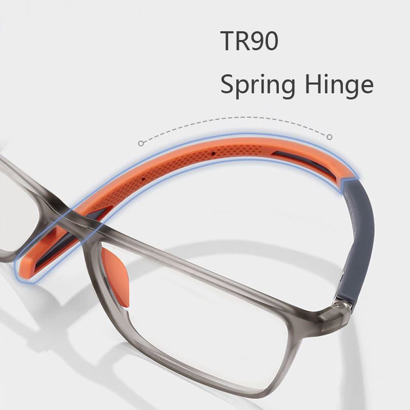 Gros plan sur une branche flexible orange avec charnière à ressort, sur monture grise translucide et plaquette nasale orange. 6