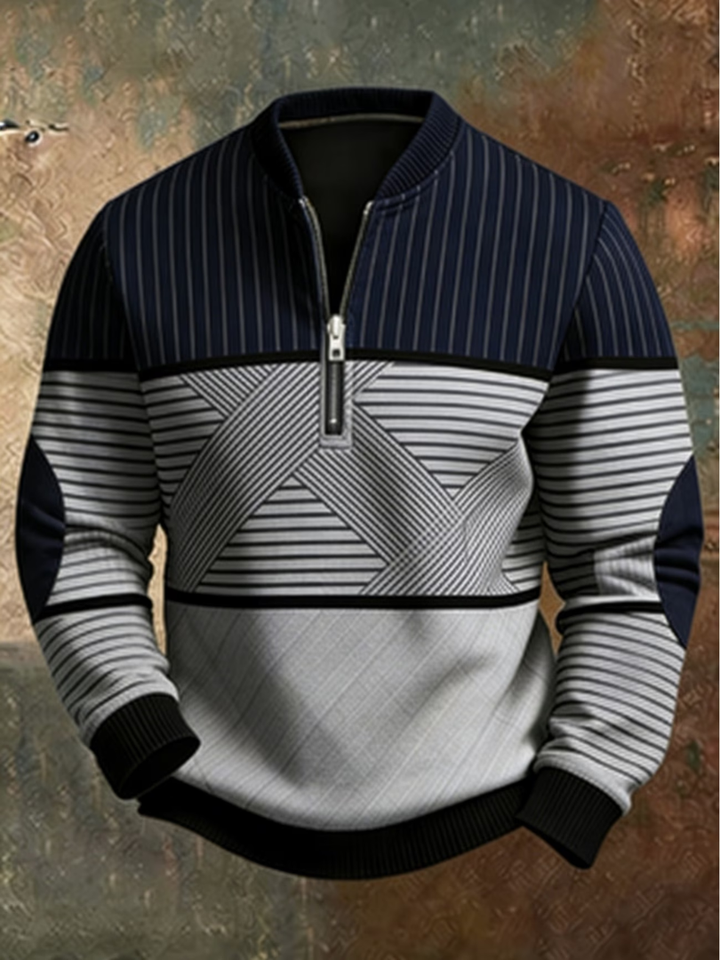 Pull à demi-zip en coloris bleu marine et gris clair, rayures verticales, horizontales et croisées, coudières, devant. 1