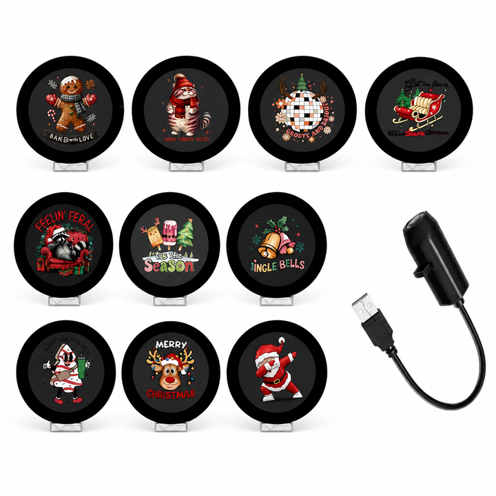 Dix disques de projection aux motifs de Noël variés, dont pain d'épice et traîneau, présentés avec le projecteur USB noir. 6