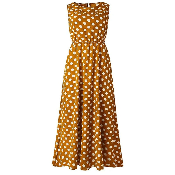 Robe longue jaune moutarde à pois blancs, vue de face à plat sur fond blanc, taille élastiquée et jupe évasée. 8