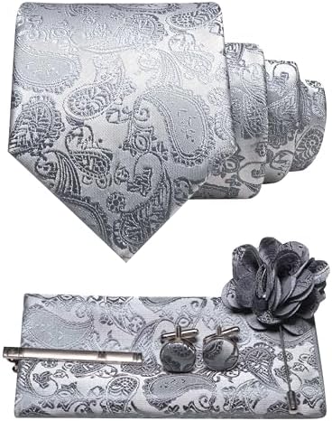 Ensemble à motif cachemire argenté et gris : cravate roulée, pochette, boutons de manchette, pince à cravate et broche fleur. 31
