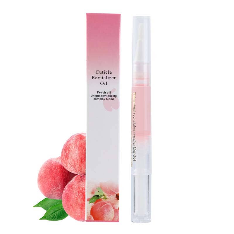 Stylo à l'huile rose pâle et sa boîte à la pêche, entourés de pêches et feuilles 17