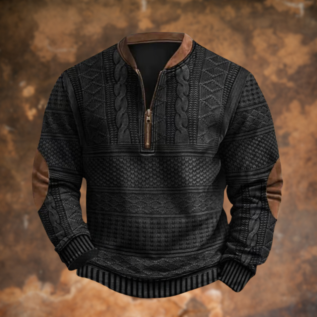 Version noire du pull demi-zip aux torsades, avec col, fermeture et coudières marron, présentée de face. 2