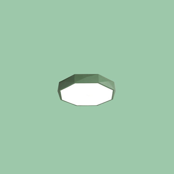 Plafonnier vert à facettes, diffuseur blanc, isolé sur fond vert 12