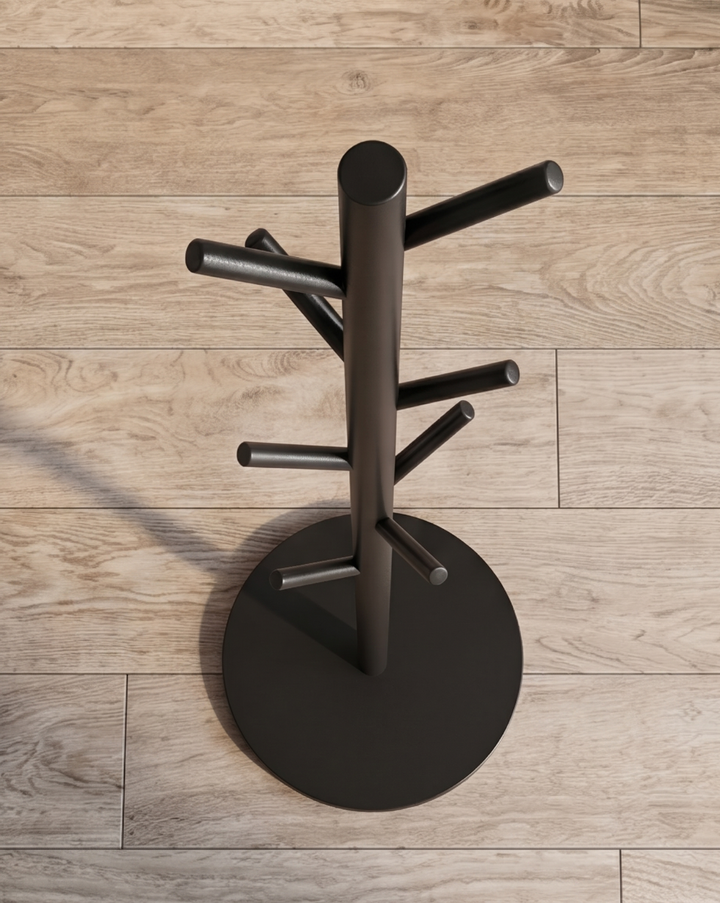 Vue de dessus de la version noire, montrant le fût, les crochets répartis autour et le socle rond sur parquet. 6