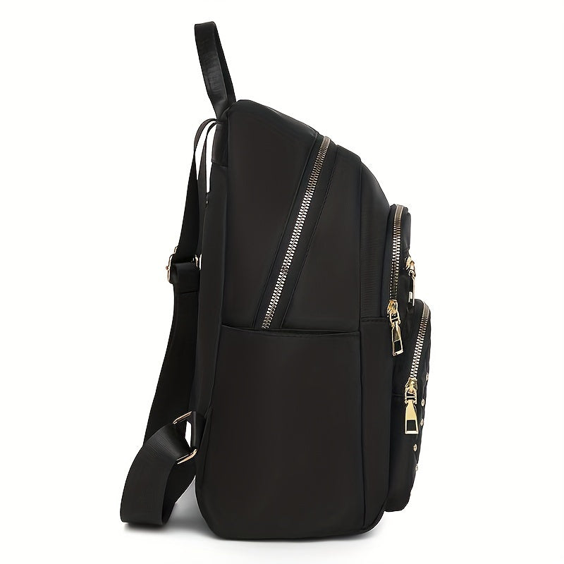 Sac à dos noir vu de profil, avec zip diagonal, poche latérale et bretelle 6