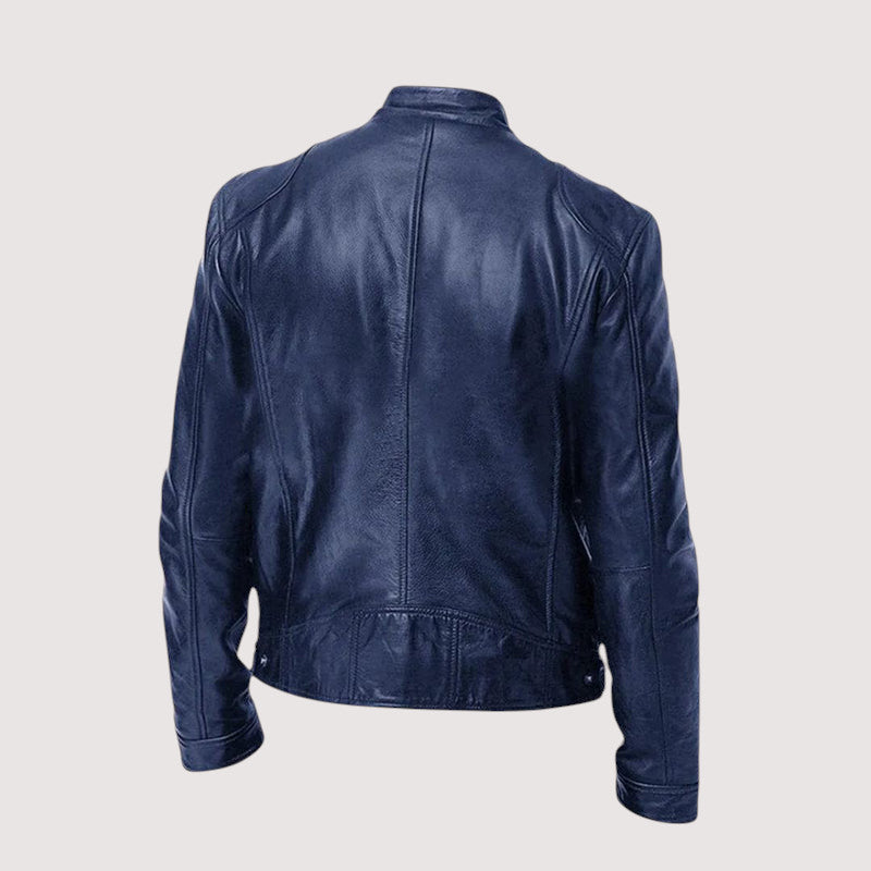 Veste bleu marine vue de dos, avec coutures verticales et bas resserré par des boutons-pression 5