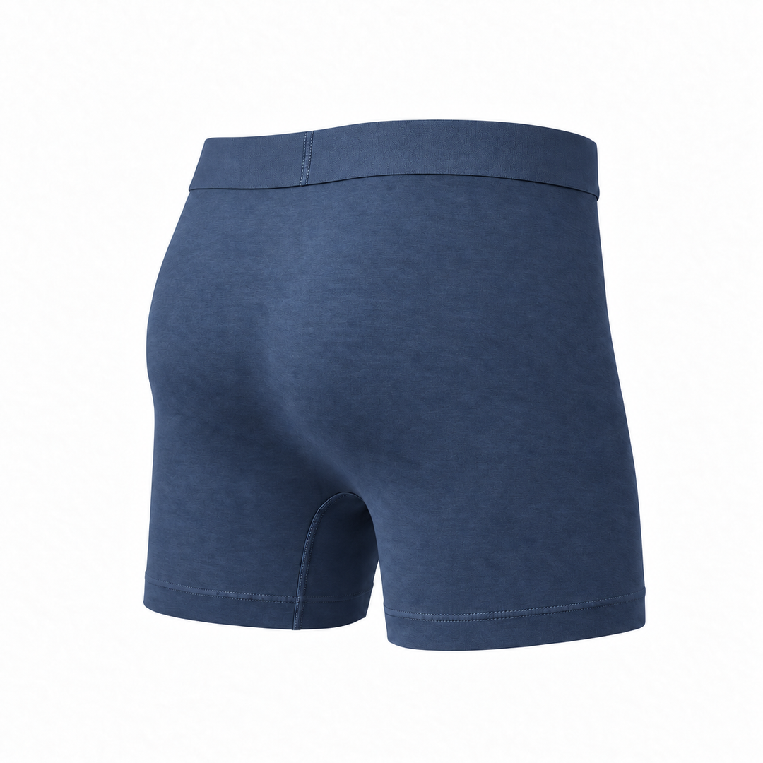 Boxer bleu denim vu de dos en trois quarts, montrant l'arrière uni et la finition des jambes. 11