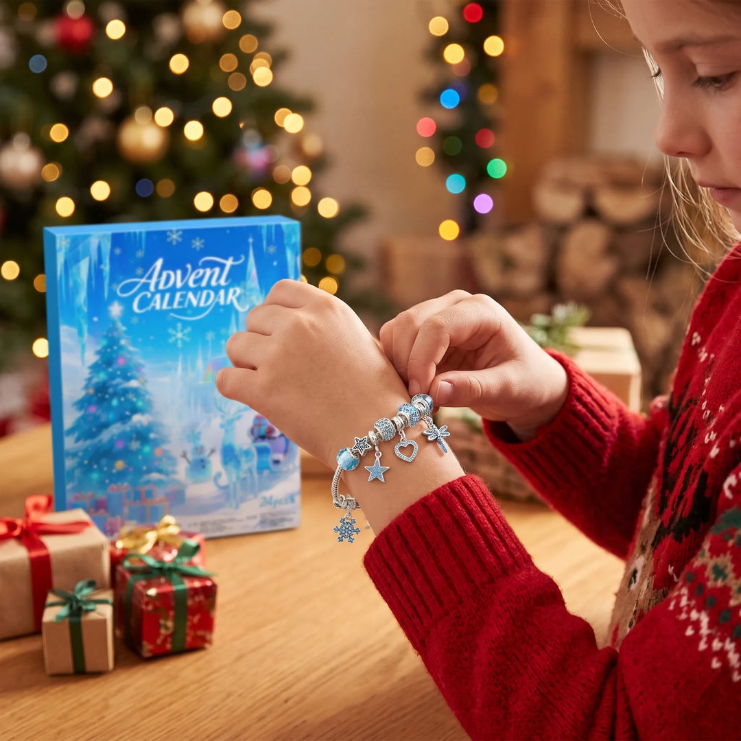 Fillette en pull rouge accrochant un charm sur son bracelet bleu, boîte du calendrier derrière elle 1