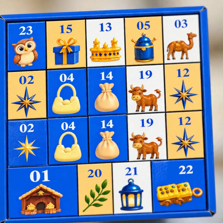 Gros plan sur la boîte bleue du calendrier avec ses petites cases numérotées illustrées de motifs de Noël 3