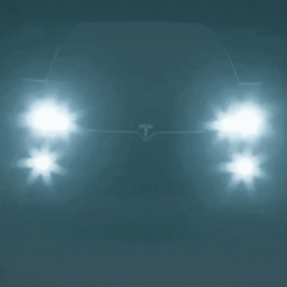 Face d'une voiture dans le brouillard nocturne, ses phares formant de grandes étoiles lumineuses qui illustrent l'éblouissement. 6