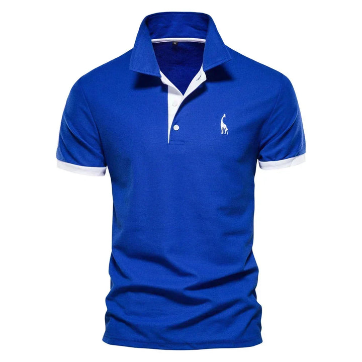 Polo bleu roi vu de face, avec détails blancs au col, à la patte de boutonnage et aux poignets 2