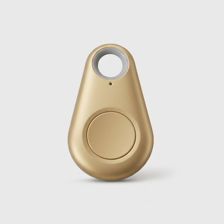 Balise dorée en forme de goutte vue de face, avec bouton rond central 11