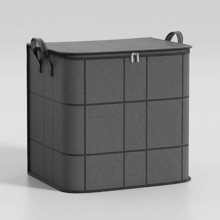 Sac gris à carreaux fermé, vu de trois quarts sur fond uni, format cubique avec deux anses. 6