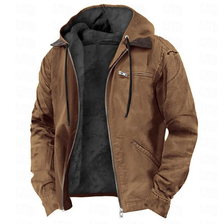 Veste zippée ouverte en coloris marron, capuche à cordons, poche poitrine zippée et doublure polaire grise bien visible. 1