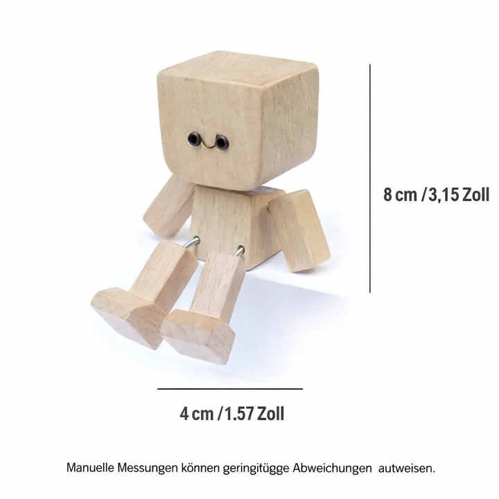 Figurine en bois sur fond blanc avec lignes de cotes indiquant sa hauteur et sa largeur, bras et jambes articulés visibles. 8