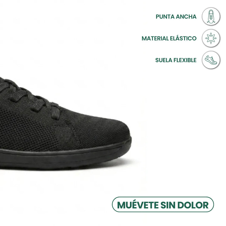 Gros plan sur le bout large de la basket noire, avec pictogrammes sur la matière élastique et la semelle flexible. 14