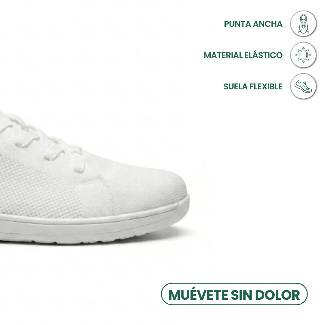 Gros plan sur le bout large d'une basket blanche en mesh à lacets, avec trois pictogrammes d'avantages à droite. 41