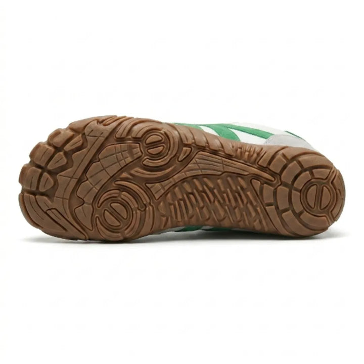 Dessous de la semelle gomme marron de la version blanche et verte, avec crampons et rainures antidérapantes sur toute la longueur. 36