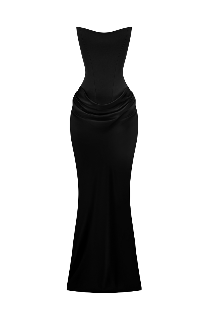 Robe noire présentée à plat sur fond blanc, bustier structuré et jupe drapée 28