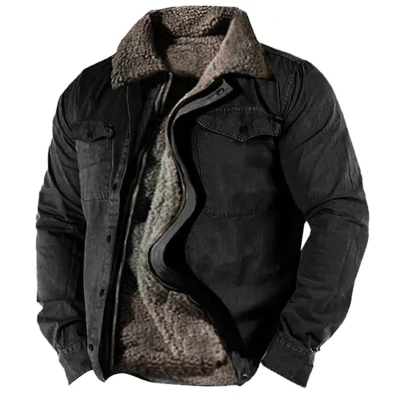Veste noire entrouverte sur fond blanc, col et doublure en laine bouclée, poches poitrine à rabat 5