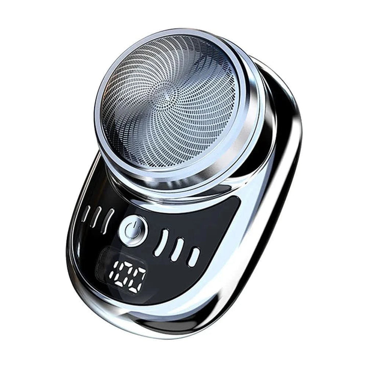Rasoir compact de teinte argentée avec bouton marche, indicateurs en relief et écran numérique, présenté sur fond blanc. 6
