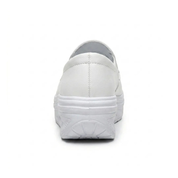 Mocassin blanc vu de l'arrière, montrant la couture du talon et la semelle compensée arrondie 18