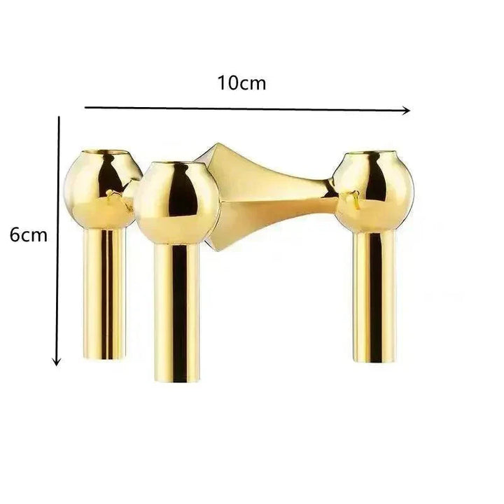 Module doré à trois têtes sphériques sur fond blanc, avec flèches indiquant les dimensions de 10 cm de large et 6 cm de haut. 7