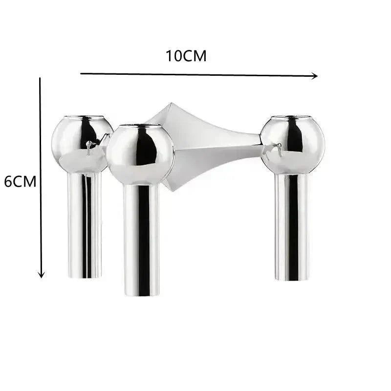 Module argenté à trois têtes sphériques sur fond blanc, avec flèches indiquant les dimensions de 10 cm de large et 6 cm de haut. 8