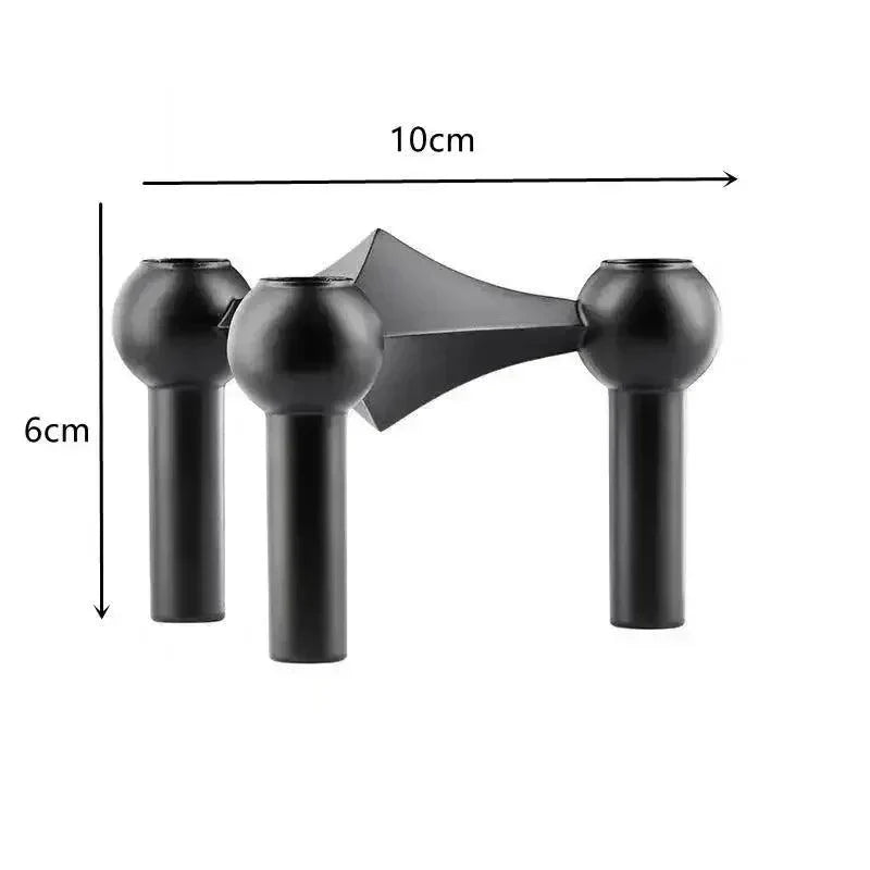 Module noir mat à trois têtes sphériques sur fond blanc, avec flèches indiquant les dimensions de 10 cm de large et 6 cm de haut. 9