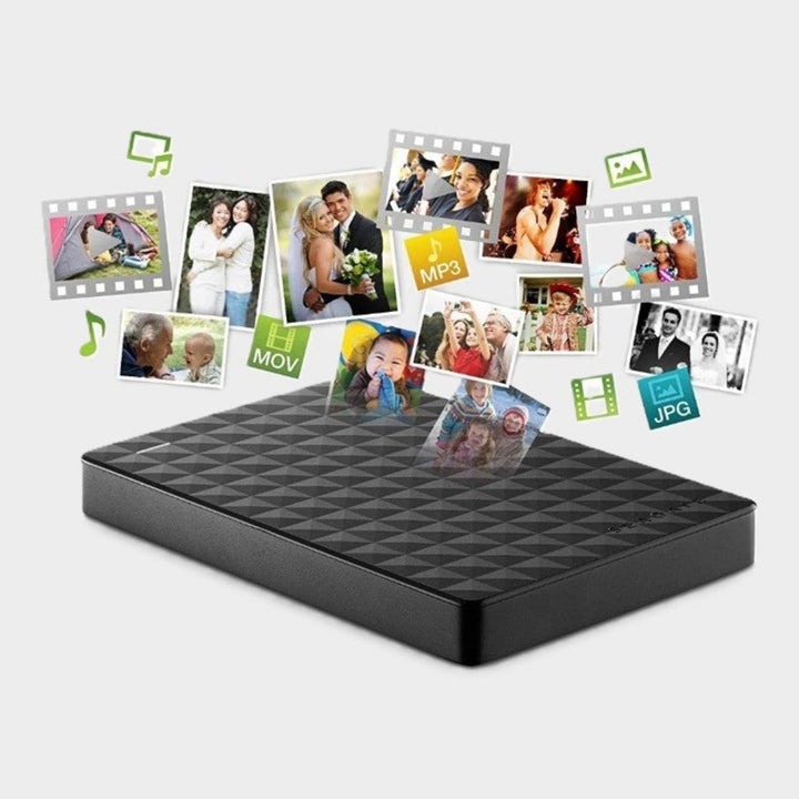 Disque noir surmonté de photos de famille, vidéos et icônes de fichiers musique et images qui s'envolent 6