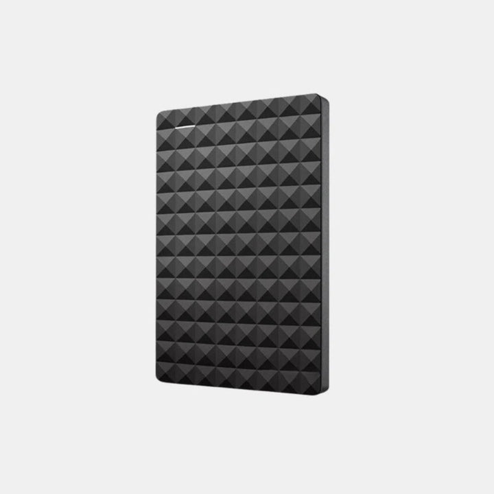 Disque noir à motif de pyramides vu de trois quarts, sur fond gris clair uni 7
