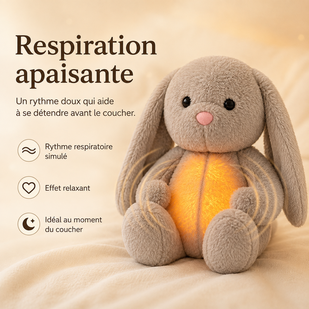 Lapin en peluche gris-beige aux longues oreilles, ventre orangé allumé, présenté pour son effet de respiration apaisante. 2