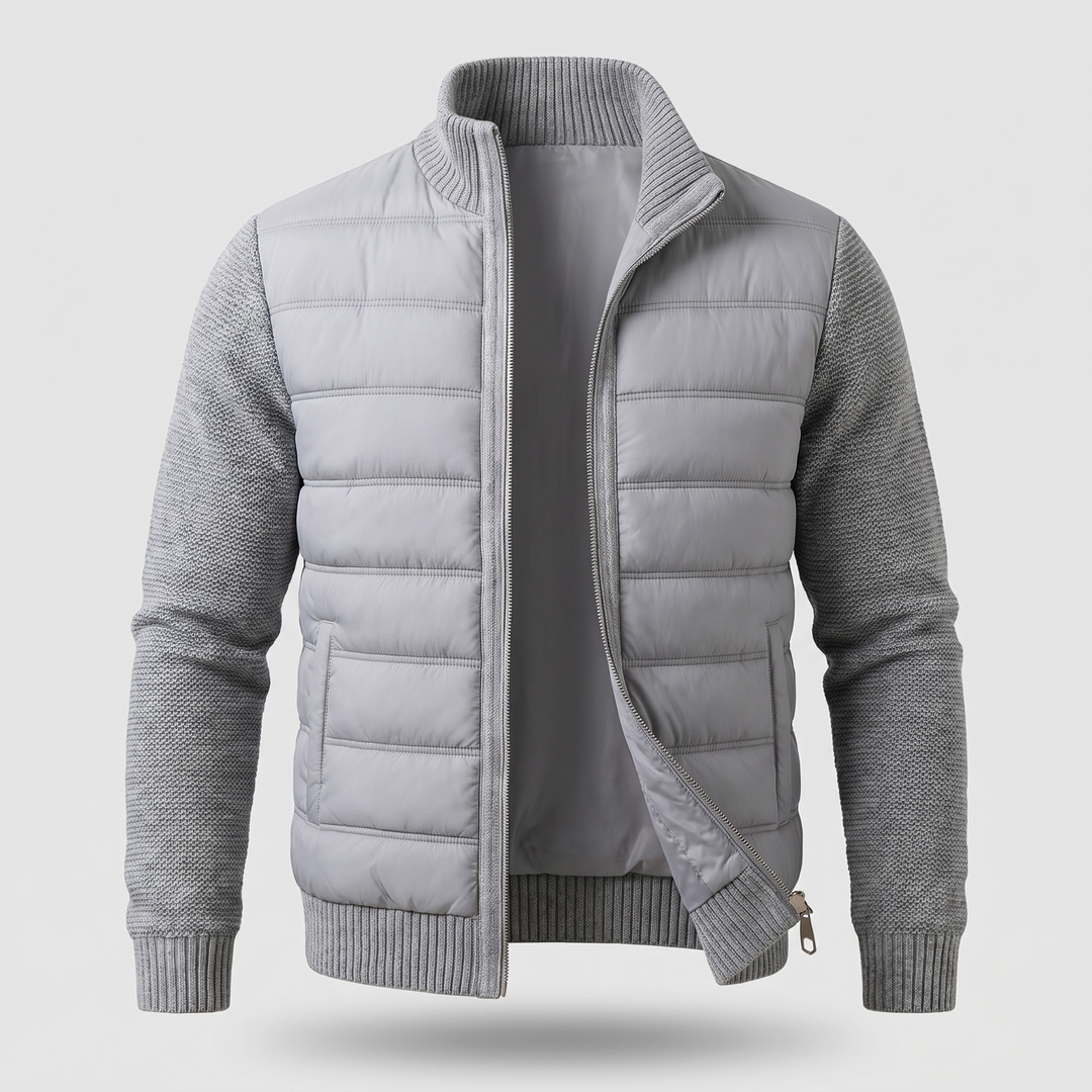 Veste gris clair vue de face, zip entrouvert montrant la doublure lisse et les poches 3