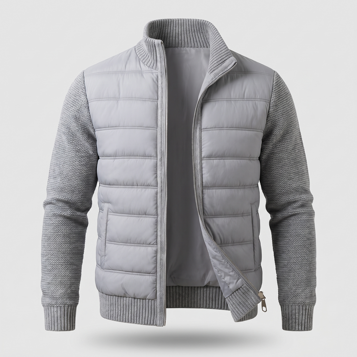 Veste gris clair vue de face, zip entrouvert montrant la doublure lisse et les poches 3