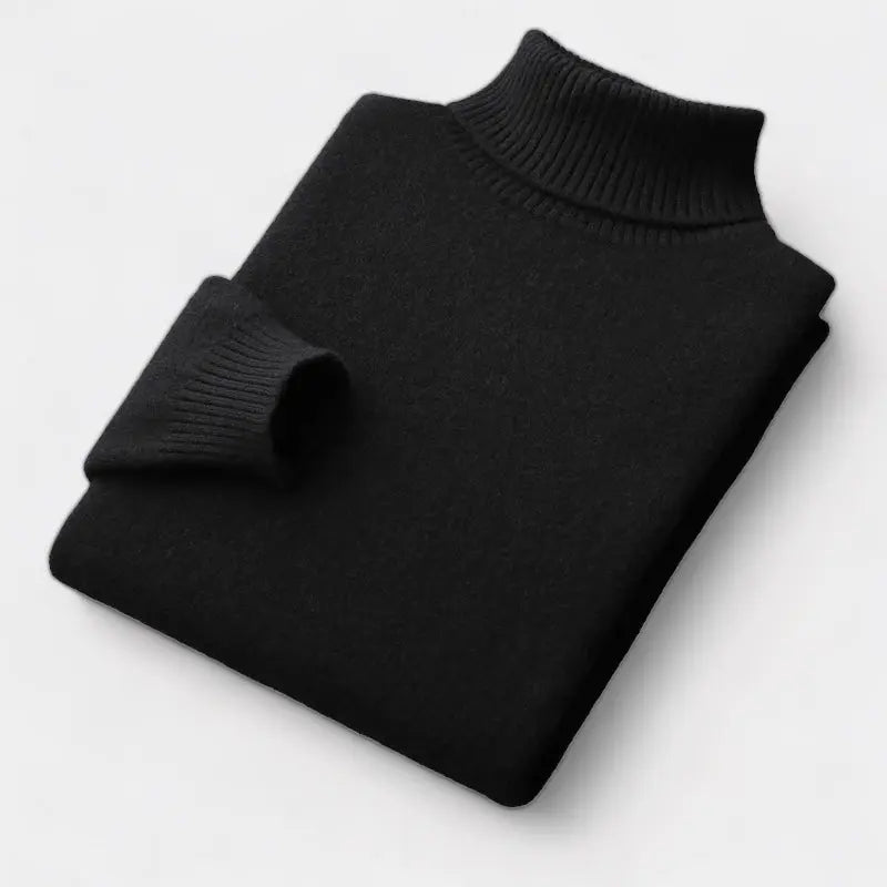 Pull à col roulé noir plié à plat, manche repliée sur le devant 5