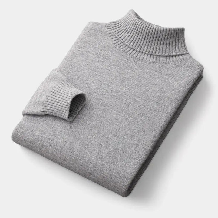 Pull à col roulé gris clair plié à plat, avec col et poignet côtelés 6