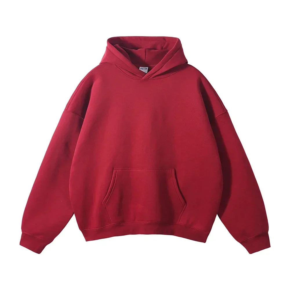 Face avant du sweat à capuche rouge bordeaux, avec poche kangourou et poignets côtelés, présenté à plat sur fond blanc. 13